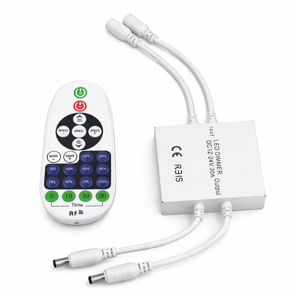 LED dimmer control system with remote and power adapter on a white background