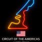 Neon sign of a race track with Circuit of the Americas details on a black background