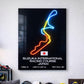 Neon light art of a racing track with text on a wall