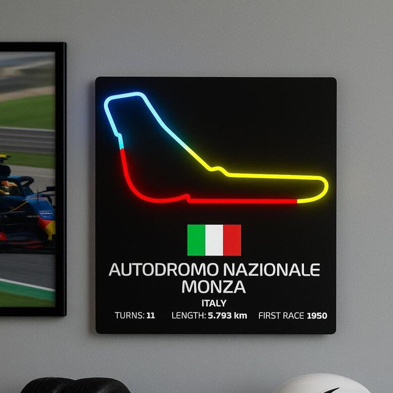 Neon sign of Autodromo Nazionale Monza race track neon sign with Italian flag on a wall.
