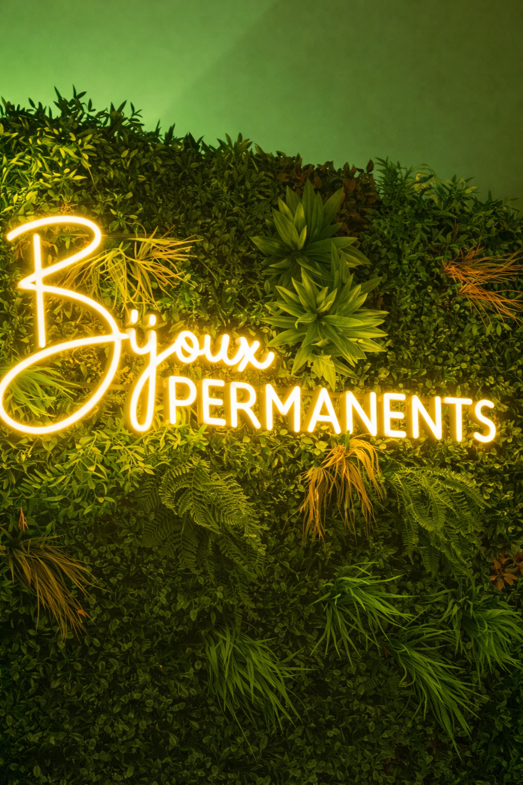 warm white neon sign for jewelry store on the grass wall feature wal, neon sign for retail store and jewelry stores