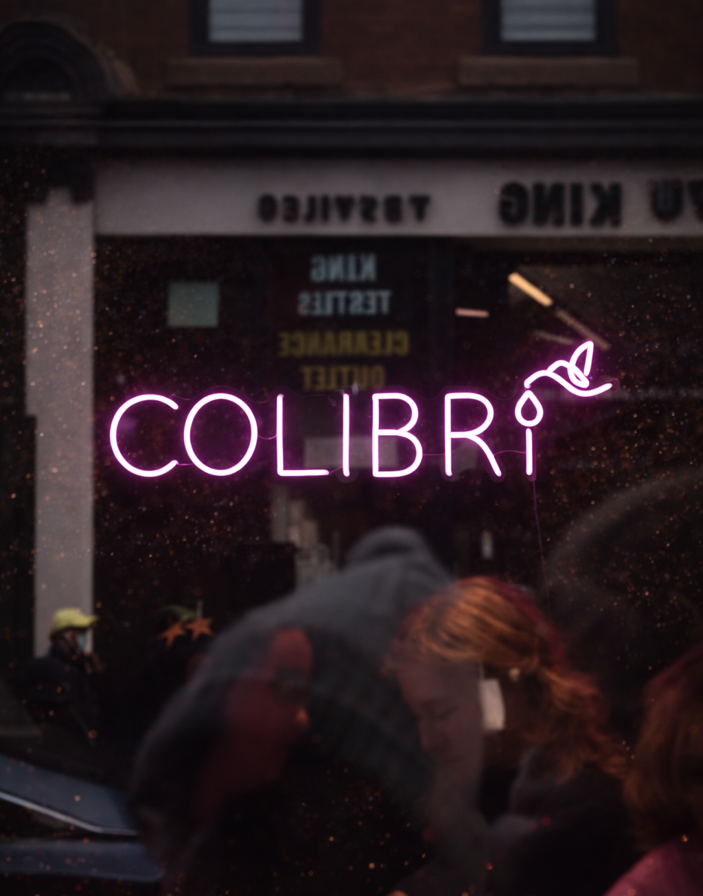 pink neon sign for tattoo shop in downtown montreal, neon sign for retail stores and feature wall