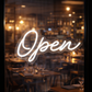 cursive open sign for business storefront